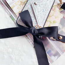 Load image into Gallery viewer, Glittery with Black Ribbon Strap Phone Cover
